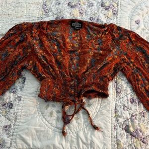 Angie size small orange flower groovy top